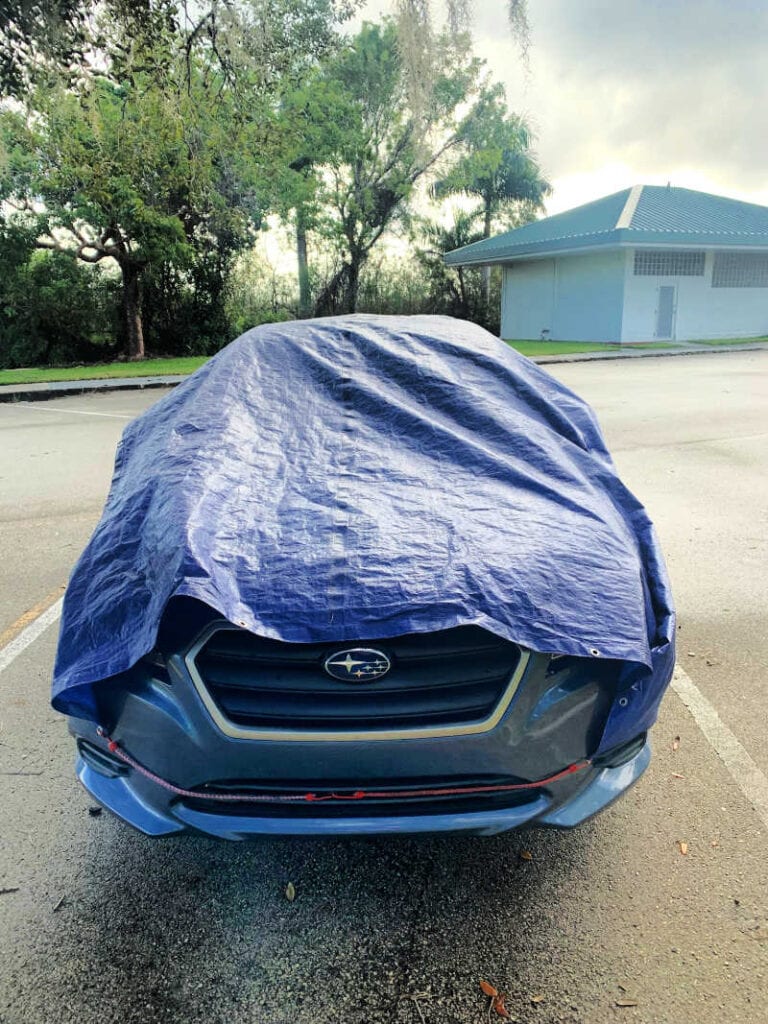 My car covered with a tarp at Everglades National Park Royal Palm Visitor Center
