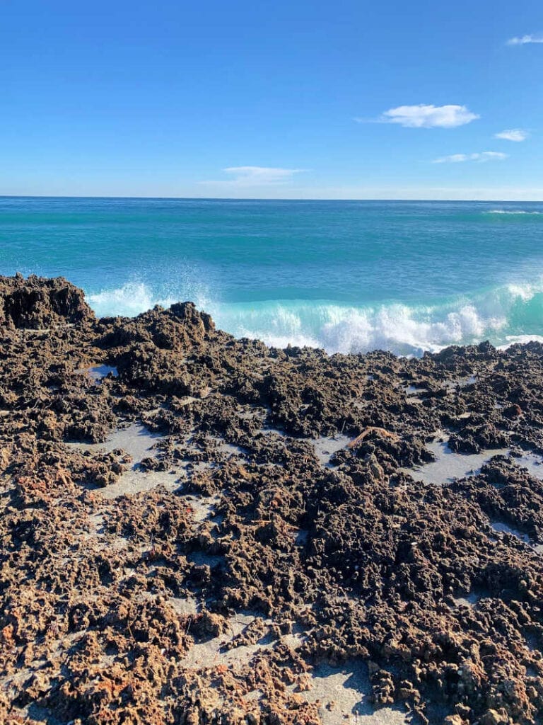 Waves crashing into the rocks at Blowing Rocks Preserve