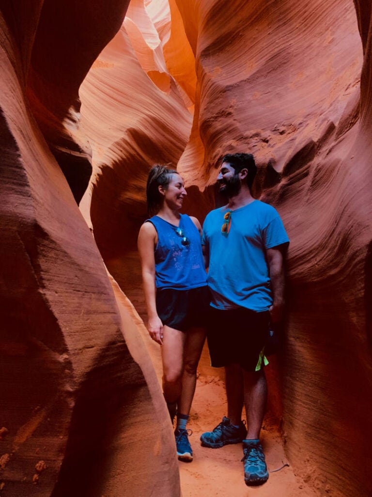 My fiance and I looking at each other surrounded by the walls of antelope canyon
