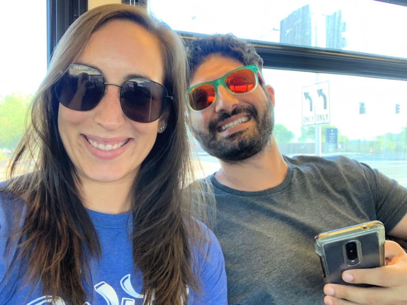 Me and my fiance smiling on the bus to get our rental car in Phoenix