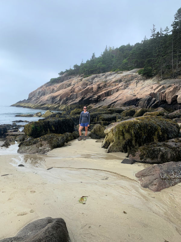 Me on Sand Beach in Acadia National Park, a must stop for a two day itinerary 