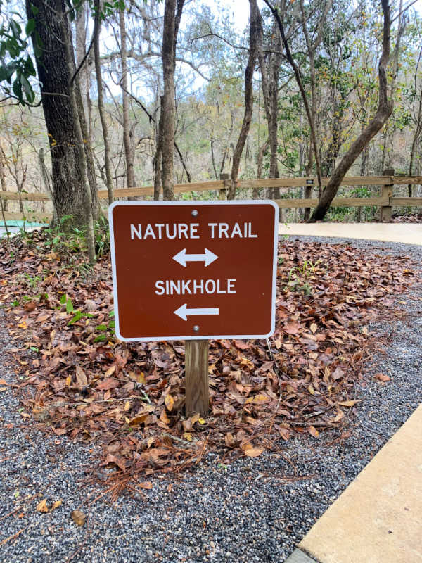 Nature trail and sinkhole sign.